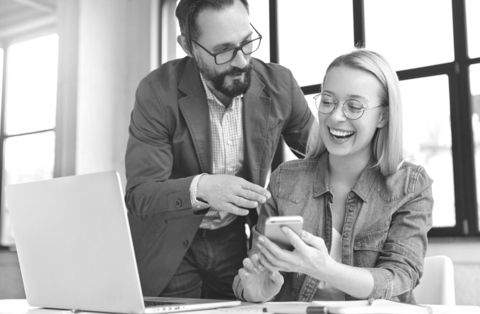 Quality assurance team reviewing test results and improvements